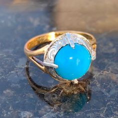 When ordering, please give us your phone number for safer Fedex shipping! RING SIZE:   5 US, 50 EU [FREE RESIZING] GOLD: 18 k, hallmarked, hand carved silver setting WEIGHT: 4.80 grams STONES: Turquoise (9mm diameter) CONDITION: EXCELLENT, polished The Antique Vintage Turquoise 18k Gold Ring is a beautiful piece of jewelry that is sure to catch the eye. It was made around the 1840s and has lettering inside of the band:A. F. V. 1842. 22. 6., after polishing we couldnt recognize this stunning antique ring. This beautiful ring would be an amazing gift for any jewelry lover. It is a size 5 US or 50 EU but we offer resizing free of charge. Your item will come boxed and wrapped carefully, sent insured by Fedex priority Mail. When ordering, please give us your phone number for safer Fedex shippin Antique Turquoise Ring In Yellow Gold, Antique Yellow Gold Turquoise Ring For Anniversary, Antique Yellow Gold Turquoise Cabochon Ring, Vintage Yellow Gold Turquoise Ring Hallmarked, Antique Hallmarked Turquoise Ring, Vintage Yellow Gold Turquoise Cabochon Ring, Antique Turquoise Anniversary Ring, Vintage Gold Turquoise Ring For Formal Events, Vintage Gold Turquoise Ring For Formal Occasions