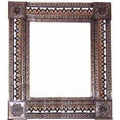 an ornate metal frame on a white background