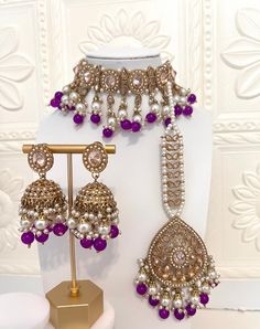 Treat yourself or someone special this Eid with a fabulous jewelry gift! Shop our extensive selection of exclusive Eid jewelry to find something perfect for every taste. Shop for a wide variety of unique wedding necklace sets, pink kundan necklaces, Bollywood earrings, and Bollywood jewelry. Our handmade Pakistani and Indian jewelry is perfect for all occasions, including weddings and Diwali, and makes a great gift for her. So don't miss out on this Eid sale and get your perfect Indian choker se Wedding Necklace Set, Bollywood Jewelry, Kundan Necklaces, Indian Earrings, Indian Wedding Jewelry, Fabulous Jewelry, Simple Necklace, Wedding Necklace, Indian Jewelry