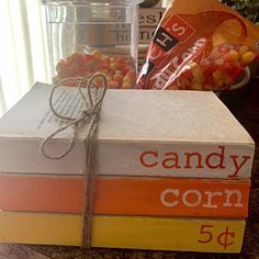 a stack of candy corn sitting on top of a counter