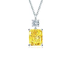 PRICES MAY VARY. Radiant Dangling Pendant Necklace: The yellow and white synthetic diamond is cut and polished into brilliance rectangle and round shape to maximise their scintillation. It is suspended from a white gold chain. With their streamlined silhouette complemented by a delicate chain that allows the stone to take centre stage. It is classic and elegant, perfect for both daywear and eveningwear. Specification: The pendant necklace is made of 1pc 6ct radiant cut rectangle shape yellow syn Pear Shaped Pendant, Synthetic Diamond, White Gold Chains, Centre Stage, Delicate Chain, Christmas Gift Jewelry, Radiant Cut, Gift Jewelry, Beautiful Gift Boxes