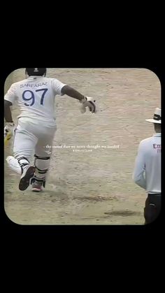 a baseball player is running in the dirt