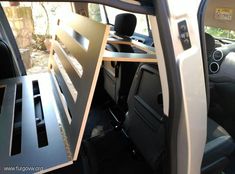 the interior of a vehicle with its doors open