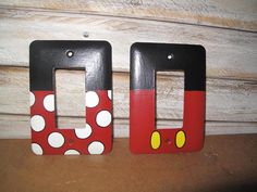 two black and red mickey mouse switch plates