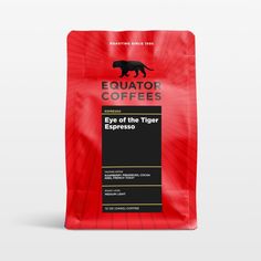 a bag of coffee that is red and black with the words equator coffees on