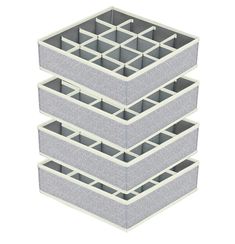 three stacks of grey storage containers stacked on top of each other