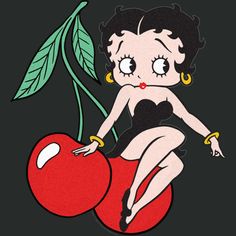 a woman sitting on top of a cherry