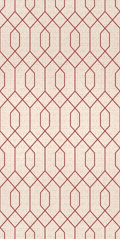 a red and white rug with small circles on the bottom, in front of an off - white background