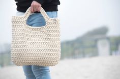 Stylish, roomy, soft and cosy crochet tote bag for those who love comfortable things! 𝙎𝙄𝙕𝙀 Approx. Dimensions of the finished tote bag: H e i g ht: ± 35 cm (13.8 inches) and ± 40 cm (15.7 inches) with handles. W i d t h : ± 37 cm (14.6 inches) 𝙒𝙀𝙄𝙂𝙃𝙏 Approx. 0.650-700 gr/1.43-1.54 lb 𝘾𝙊𝙇𝙊𝙍 𝙊𝙉 𝙋𝙃𝙊𝙏𝙊 6. Cream ✘Rope with UV protection! In to continual outdoor sunlight exposure does not changes the color. ✘Please note that colors may vary due to your computer's settings, monito Modern Straw Bag For Everyday Use, Modern Rectangular Crochet Bag For Everyday, Modern Everyday Rectangular Crochet Bag, Chic Cream Crochet Bag For Everyday, Chic Cream Everyday Crochet Bag, Modern Crochet Tote Bag For Everyday Use, Modern Natural Crochet Bag For Everyday, Modern Crochet Shoulder Bag For Everyday Use, Modern Crochet Bag With Double Handle For Everyday Use