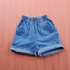 Denim shorts  wide elastic waist 90's vintage have pockets but no back pockets vintage size 10 (vintage sizes run small these have a 22/28" waist that is stetchy modern size 4/6 high waisted north west blues brand medium wash 22/28" waist 42" hips 14" front rise 17" back rise 19" full length Summer High Waist Pull-on Jeans, Short Length Denim Jeans With Elastic Waistband, Retro Denim Bottoms With Built-in Shorts, Medium Wash Jean Shorts With Elastic Waistband, High Rise Pull-on Style Bottoms For Summer, Jean Shorts With Elastic Waistband In Medium Wash, Medium Wash Denim Shorts With Elastic Waistband, Denim Jean Shorts With Elastic Waistband, Denim Shorts With Elastic Waistband