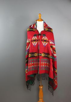 Wear it now for warmth, wear it later to a music fest. Even wear it and use it as a blanket for those spontaneous summer nights. This poncho will be your go to piece all year round! Details: 100% Acrylic Red or Navy One size fits most Casual Beach Shawl For Fall, Casual Fall Beach Shawl, Winter Festival Shawl Outerwear, Casual Shawl Poncho For Festivals, Red Poncho For Festival In Fall, Winter Festival Poncho, One Size, Winter Festival Poncho One Size, Red Fall Festival Poncho, Red Bohemian Poncho With Fringe