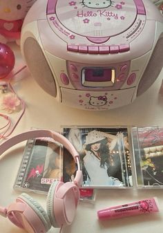 katie wilmot aesthetic | boys of tommen Y2k Boombox Aesthetic, Y2k Radio Aesthetic, 2000s Aesthetic Hello Kitty, Hello Kitty Early 2000s, Hello Kitty 2000s Aesthetic, Decorated Cd Player, 2000s Cd Player, Cute Cd Player, Dvd Player Aesthetic