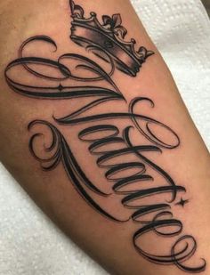 a tattoo with the word queen on it