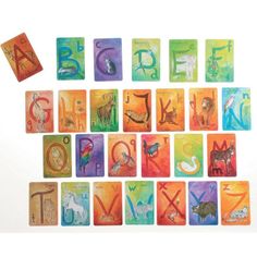 the alphabet is made up of colorful cards with animals and letters written in different colors