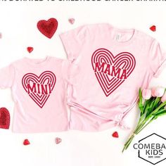 "Mommy and Me Valentine Shirts, Mama Heart Mini Heart Matching Valentine's Day Mother Daughter Outfits Baby Toddler Kids Mom Gift This adorable mommy and me Valentine shirts is perfect for Valentine's Day. This Valentines saying will bring joy to anyone who reads it.  EACH SHIRT IS SOLD SEPARATELY, PLEASE ADD EACH SHIRT ONE AT A TIME TO YOUR CART THEN CHECK OUT. + Machine washable & dryer safe (I recommend drying on delicate) + Design color will depend on the color of the shirt that you select. Pink Heart-shaped Top For Valentine's Day, Cute Pink T-shirt With Heart Print, Playful Pink Tops For Mother's Day, Pink Matching Tops For Mother's Day, Cute Pink Tops For Family Occasions, Family Matching Pink Tops For Valentine's Day, Pink Heart Print T-shirt For Valentine's Day, Pink Tops For Mother's Day Gift, Pink Top For Mother's Day Gift