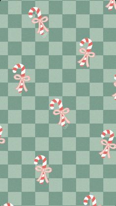 candy canes and bows on green checkered background for wallpaper or wrapping paper