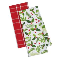 two christmas napkins with holly leaves and berries on them, one is red and the other is white