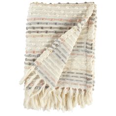 a white blanket with fringes on the bottom and one side is folded in two different colors