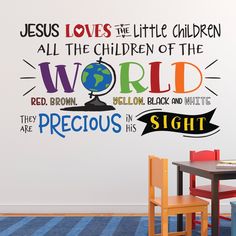 a child's room with a wall decal that says jesus loves the little children all the children of the world