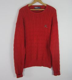 "Polo Ralph Lauren Golf Vintage Long Sleeve Cable Knit Crewneck Sweater Red, Plaid Polo Golf Logo on Front 100% Cotton Size: Large - Runs Large - See Measurements Pit to Pit: 27.5\" Length: 29\" Sleeve: 28.5\" (shoulder to unturned cuff hem) Very good condition - Light pilling" Red Wool Sweater For Workwear, Red Wool Sweater For Work, Classic Red Sweater With Ribbed Collar, Red Wool Long Sleeve Sweater, Red Long Sleeve Wool Sweater, Classic Wool Knitted Tops, Vintage Wool Sweater For Workwear, Ralph Lauren Golf, Golf Logo