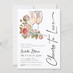 two wine glasses with flowers on them are shown in this bridal shower