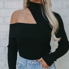 Asymmetrical Black Top. Black Asymmetrical Solid Color Tops, Black One-shoulder Top For Work, Black Top With Asymmetrical Neckline For Spring, Black Asymmetrical Neckline Top For Spring, Fall Black One Shoulder Top, One-shoulder Black Top For Fall, Fall One-shoulder Black Top, Black Top With Asymmetrical Neckline For Fall, Asymmetrical Tops For Spring Going Out