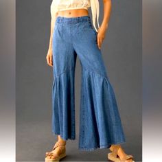 Pilcro High-Rise Ruffle-Hem Culotte Jeans * 100% Cotton * Front Slant Pockets * Back Patch Pockets * Pull-On Styling - Back Zipper * Machine Wash * Imported Dimensions * 12" Rise * 25" Inseam * 31.5" Leg Opening * Nwt * Size 27 Bohemian High Rise Bottoms For Spring, Bohemian High-rise Bottoms For Spring, Bohemian Flare Jeans For Summer, Spring Medium Wash Bottoms With Ruffles, Spring Bottoms With Ruffles In Medium Wash, Chic Ruffled Medium Wash Bottoms, Black Thunder, Cropped Cargo Pants, Kick Flare Jeans