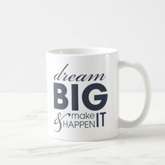 a white coffee mug with the words dream big and make it happen written on it