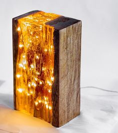 a wooden block that has some lights on it