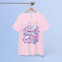 Pastel Goth Short Sleeve T-shirt For Streetwear, Pink Cotton Emo T-shirt, Pink Kawaii Anime Print T-shirt, Pink Short Sleeve Emo Tops, Pastel Goth Cotton Short Sleeve Tops, Pink Emo Style Cotton T-shirt, Pink Cotton Pastel Goth Top, Pastel Goth Short Sleeve Top With Graphic Print, Pastel Goth Tops With Graphic Print Short Sleeves