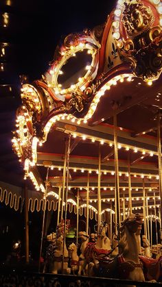 a merry go round at night with lights