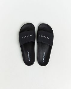 The 1908 Polysoft slides by Superga come in a black colourway. The slides are designed with a slim fit, rubber sole, polysoft upper and contrast signature branding. Teen Shopping, Destination Dress, Outdoor Play Equipment, Play Equipment, Jersey Top, Outdoor Play, Skirted Swimwear, Denim Shop, Playsuit Jumpsuit