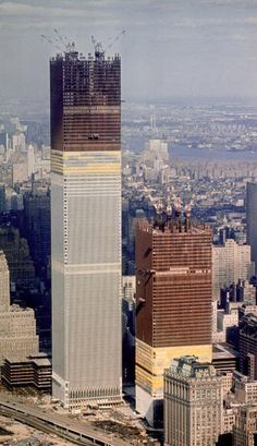 an aerial view of two skyscrapers in new york city