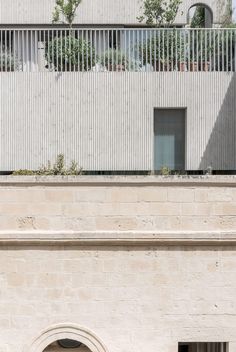 a man riding a skateboard down the side of a building