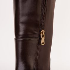 Materials Upper: LeatherLining: LeatherSole : Rubber Heel: 2" Windsor Bitter Coffee Toned Leather Knee High Women Boot Exclusively Crafted from 100% Cowhide Leather for Unparalleled Elegance Material and Craftsmanship: Meticulously handcrafted from 100% genuine cowhide leather. The calf portion's elastic fabric is designed for a personalized fit on every leg. Comfortable Insole: Features a natural padded leather insole ensuring optimal comfort. Durable Rubber Sole: The boot boasts a durable rubb Brown Leather Knee High Boots, Women Boot, Knee High Leather Boots, Rubber Heels, Knee High Boots, Cowhide Leather, Windsor, Knee High, Brown Leather