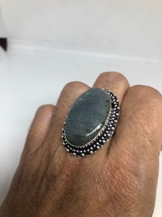 Huge blue green Labradorite rainbow moonstone Lovely vintage silver setting is low content silver Size 8.5 My jeweler can re size it up or down for a $10-$20 fee All rings are shipped in a nice gift box. Check out our over a THOUSAND great reviews Engraving is $4 per letter and is not always perfect depending on the piece. It can take a few days if the jeweler is busy. This is payable to Paypal Judithsltd@gmail.com Silver Sapphire Ring With Large Stone As Gift, Vintage Moonstone Ring With Large Stone For Gift, Vintage Moonstone Ring With Large Stone As Gift, Blue Labradorite Rings As Gift, Blue Labradorite Rings For Gift, Blue Labradorite Rings For Gifts, Gift Blue Labradorite Rings, Silver Sapphire Cabochon Ring Gift, Silver Sapphire Ring With Natural Stones As Gift