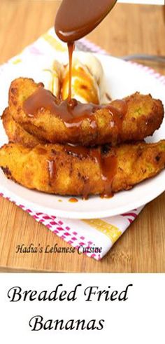 breaded fried bananas are drizzled with caramel sauce on a white plate