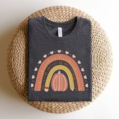 Celebrate the cozy vibes of autumn in style with our Fall Teacher Shirt! This pumpkin-themed masterpiece is perfect for both kindergarten and preschool teachers, exuding a warm, autumnal charm that's perfect for the classroom or fall homeschool sessions. Embrace the season of change with this must-have autumn teacher shirt, designed to keep you comfortable and in the spirit of learning all season long.See our full fall collection linked below 🍁 ☀️☀️☀️ >>Printed on Adult Unisex Bella + canvas Tee >>Direct to garment printing >>Size up 1-2x for the popular oversized tee look! >>See size chart, and measure a favorite shirt of yours to compare lengths/widths >>Youth printed on Gildan and Baby printed on Rabbit Skins Items are made to order, and cannot be returned unless there is a damage issu Cute Multicolor Fall T-shirt, Fall Homeschool, Fall In Love With Learning, Preschool Teacher Shirts, Kindergarten Teacher Shirts, Second Grade Teacher, School Collection, First Grade Teachers, Kindergarten Teacher