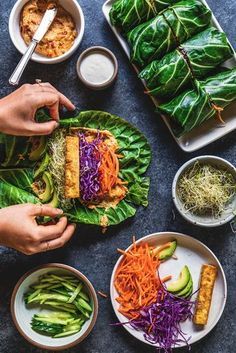 people are eating food from plates on the table