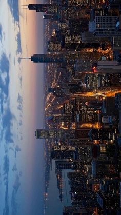 an aerial view of new york city at night from the top of the empire building