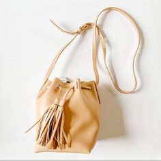 Adorable Bag, Brand New With Tags. 8 X 7 X 5” Spring Cream Leather Shoulder Bag, Cream Leather Shoulder Bag For Spring, Leather Satchel For Spring Errands, Spring Leather Bucket Bag, Leather Bucket Bag In Beige For Spring, Spring Leather Beige Bucket Bag, Spring Beige Leather Bucket Bag, Spring Leather Crossbody Bucket Bag, Spring Soft Leather Crossbody Bag