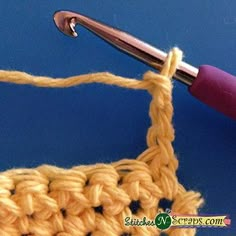 the crochet stitch is being worked on