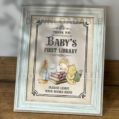 a baby's first library sign with winnie the pooh