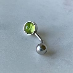 "Peridot Belly Button Ring/316L Surgical Steel/Hypoallergenic/14 Gauge Body Jewelry/Gift for Her/August Birthday Present/Piercing ** SHIPS OUT IN 1 BUSINESS DAY!! ** ~ These Hypoallergenic bellybutton rings feature a beautiful 6mm Genuine Peridot Cabochon. ~ Perfect for sensitive skin, making a great gift choice for the \"hard to buy for\" or even a gift for YOURSELF! 💕 ~ These 316L Surgical Steel belly rings feature a 5mm externally threaded ball. ~ The gauge of the bar is 14g and the length m Dark Green Belly Button Piercing, Belly Button Rings Simple, Minimalist Nickel-free Belly Rings As Gift, Hypoallergenic Stainless Steel Belly Rings As Gifts, Minimalist Adjustable Belly Rings For Gift, Hypoallergenic Stainless Steel Piercings As Gift, Nickel-free Round Stainless Steel Belly Rings, Nickel-free Stainless Steel Belly Rings For Gift, Nickel-free Stainless Steel Belly Rings As Gift