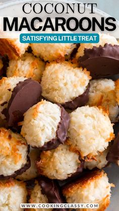 coconut macaroons sitting on top of a white plate with chocolate in the middle