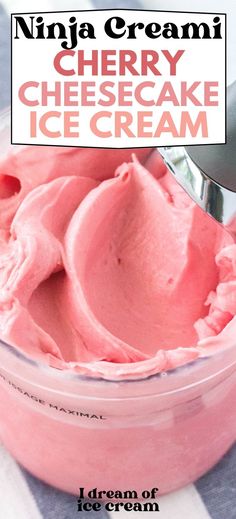 a close up of a bowl of ice cream with the words cherry cheesecake ice cream