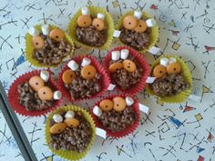 some cupcakes are decorated to look like animals