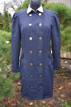 Vintage Frankenwölder dark blue dress 70s.  Length ~ 93cm. Chest ~ 49cm. Waist ~ 43cm. Hips ~ 50cm. Shoulders ~ 39cm. Sleeves ~ 60cm. Good vintage conditions. Fitted Blue Outerwear With Covered Buttons, Fitted Vintage Dress With Buttons For Workwear, Blue Vintage Winter Dresses, Navy Fitted Winter Dress, Retro Navy Dress For Formal Occasions, Navy Retro Formal Dress, Navy Retro Dress For Formal Occasions, Fitted Vintage Dress With Button Closure For Work, Fitted Vintage Dress For Winter Formal