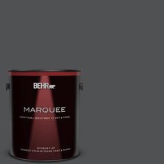 behr marquee interior paint in one gallon, with the light shining on it