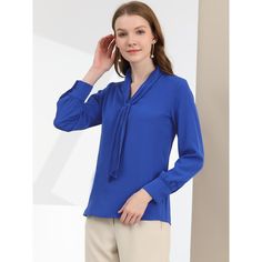 It features a classic design with a tie and long sleeves with button cuffs, creating a fitted silhouette, especially for work or office. Designed in a fluid, flowing fabric that drapes beautifully around the body. Offering effortless style, the blouse falls beautifully on the body and features a subtly pleated design to add to the delicate nature. A tie front design creates a feminine finish on this shirt, an everyday staple for the office. Style it with your favorite jeans and heels for a styli Clothing Blouses, Office Blouse, Flowing Fabric, Chiffon Long Sleeve, Office Style, Peasant Blouse, Chiffon Blouse, Tie Neck, Front Design